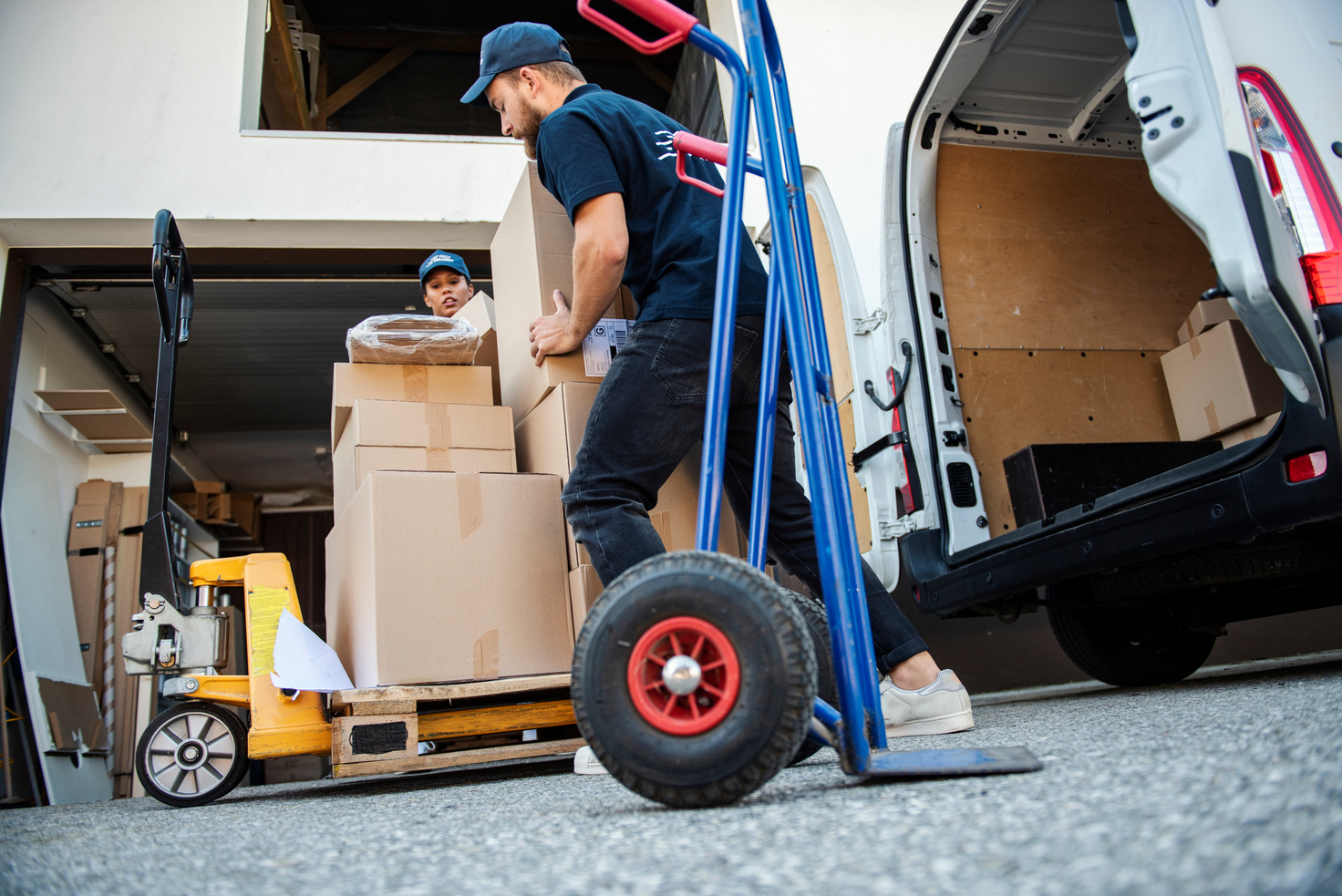 Delivery Workers Loading Delivery Van